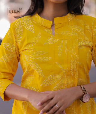 Front view of lemon yellow cotton kurti