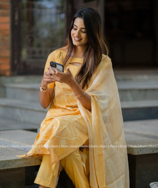 Close-up of cotton fabric in warm yellow hue