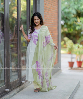 Flat lay of orchid cotton kurti set with accessories