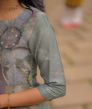 Elegant green kurti with elbow sleeves and floral print design