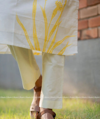 Dupatta draped over ivory cotton kurti set