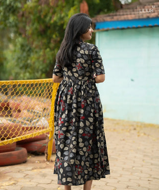 Flowing Hem of Stygian Crown Maxi Dress