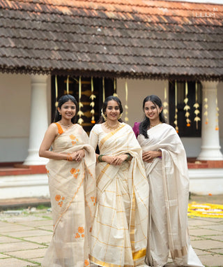 Elegant white saree for Onam festival wear