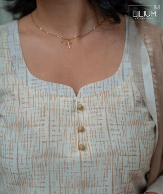 Model styling Mushroom Beige kurti in outdoor setting