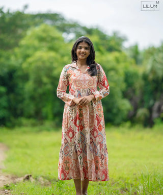 Woman wearing Siberian cotton maxi dress with ethnic print