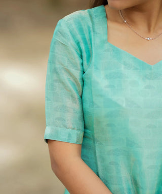 Close-up of tissue silk fabric texture in AquaCraft Green