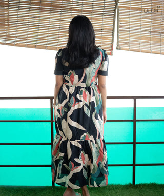 Flowy silhouette of Obsidian maxi dress displayed flat