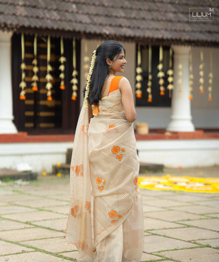 White Saree with Orange Border and Patterns