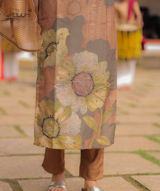 Graceful ethnic wear in floral design perfect for Onam