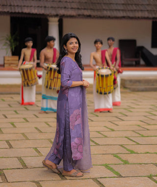 Elegant floral kurti set styled for Onam celebration