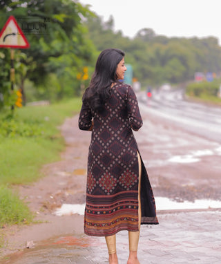 Model posing in garnet weave muslin kurti