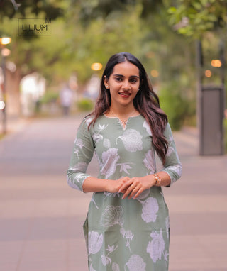 Casual lace-trimmed kurti in celadon green – back view
