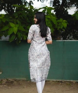 Flat lay of tissue silk kurti in silver hu