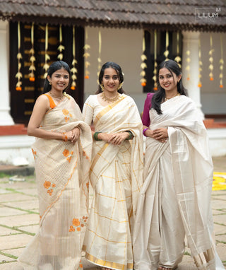 Elegant white cotton saree for Onam festival wear