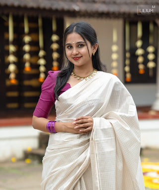 Traditional Kerala saree in white muslin silk